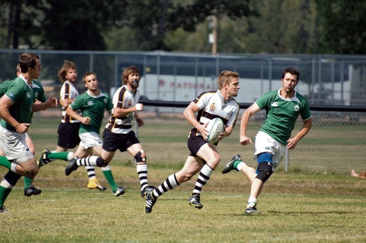 Banff Bear Matthew Cole legs it out against the Calgary Irish, Saturday (Aug. 24) at the Banff Rec Grounds.
