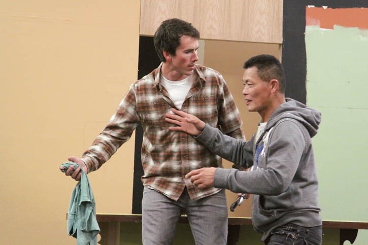 Christopher Yee, right, and William Doyle rehearse for Pine Tree Players’ new work, This Ruddy Desert, Monday (Oct. 28).