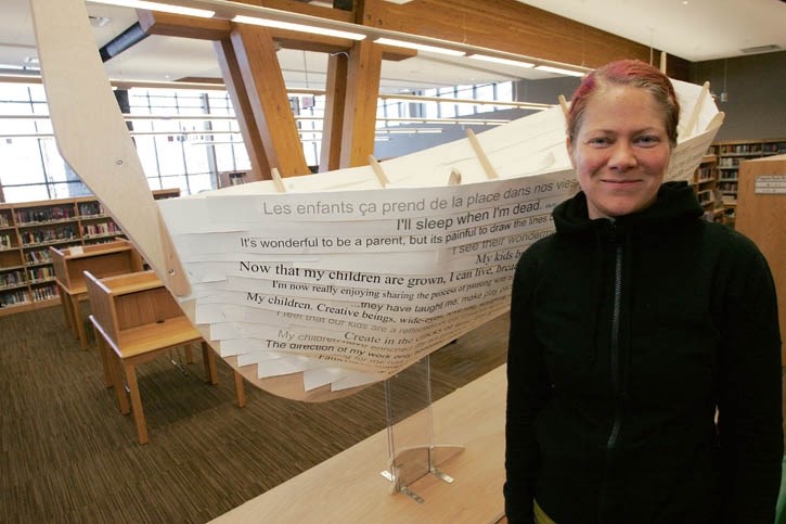 Pascale Ouellet with her art installation at the Canmore Library.