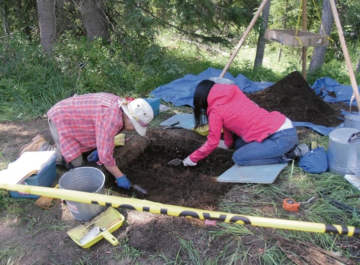 Archaeologists dig at the Echo Creek site last summer, which was inadvertently damaged during construction of the Legacy Trail west of Banff.