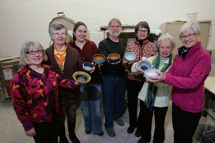 Potters Katie Borrowman, John Borrowman and Priscilla Janes show off chili bowls with Mountain Grannies Georgia Bell, Josie Emmet, Pat Grayling and Nel Keith.