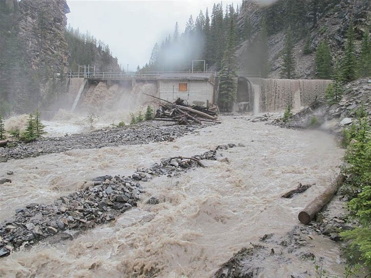 The Town of Banff is planning to demolish a portion of the Forty Mile Dam, seen here during the June 2013 flood.