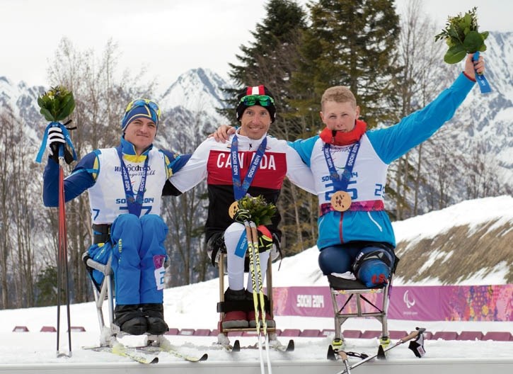 Chris Klebl receives gold for the men’s 10km cross-country sit ski race at the Paralympic Winter Games in Sochi.