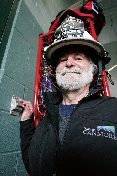 Canmore Mayor John Borrowman flicks the switch for Sunday morning’s (May 4) emergency siren test. The test, part of Emergency Preparedness Week, had a disappointing result,