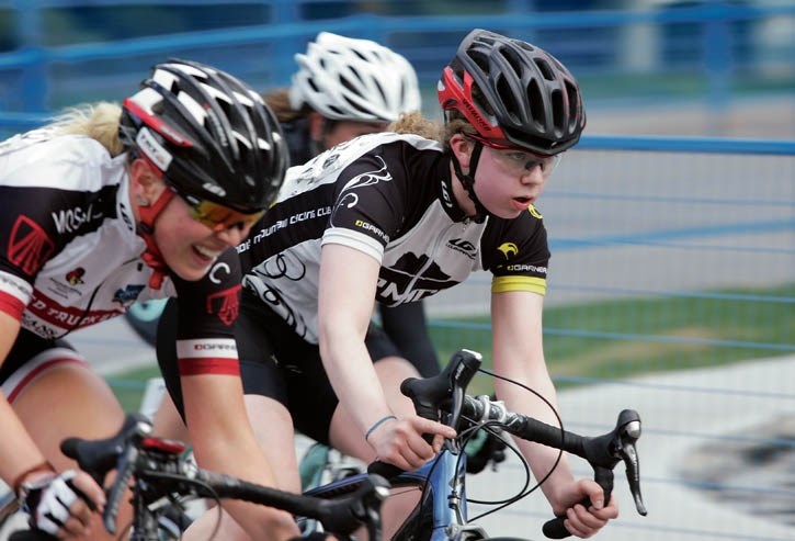 Liah Harvie, 16, rubs elbows with the best on the Bike Fest criterium course in downtown Banff Saturday (June 14).