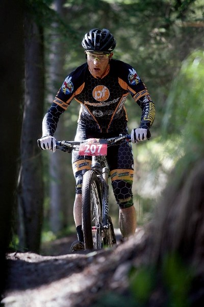 Jon Firth races away from the pack to claim victory by more than an hour in the Rundle’s Revenge 100-kilometre mountain bike leg Saturday (June 21).