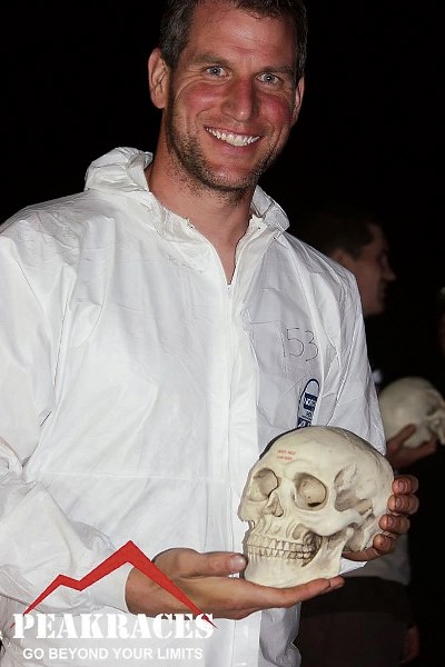Nick Martin holds his finisher’s skull after completing the Spartan Summer Death Race in Vermont.