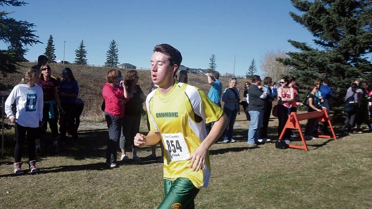 Marc Dupuis competes in the Alberta cross-country running high school championships.