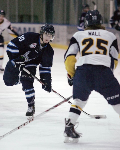 Matt Forchuk looks to shoot during the Eagles loss to the Calgary Mustangs Saturday night (Feb. 13).