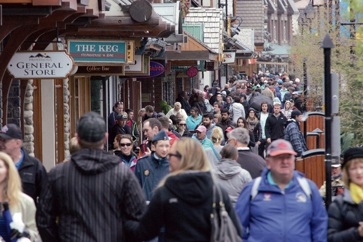 Visitors flock to Banff Avenue