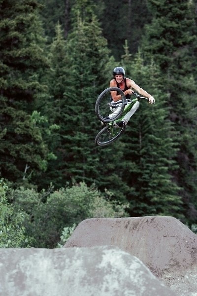 Gavin Conner launches into the air at the new Benchlands Trail dirt jump line.