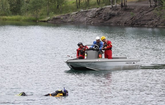 Canmore Fire Rescue searchers and a snokeller probe Quarry Lake for a woman reported missing, Sunday (July 12).