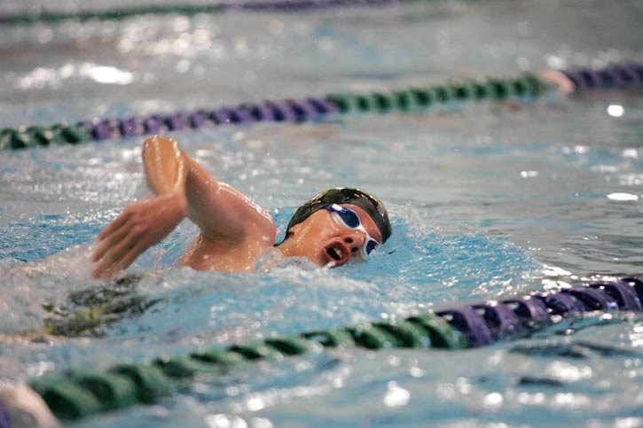 Carter Beamish swims the 400-metre freestyle in the Coho swim club’s home pool at Elevation Place Friday (July 24)