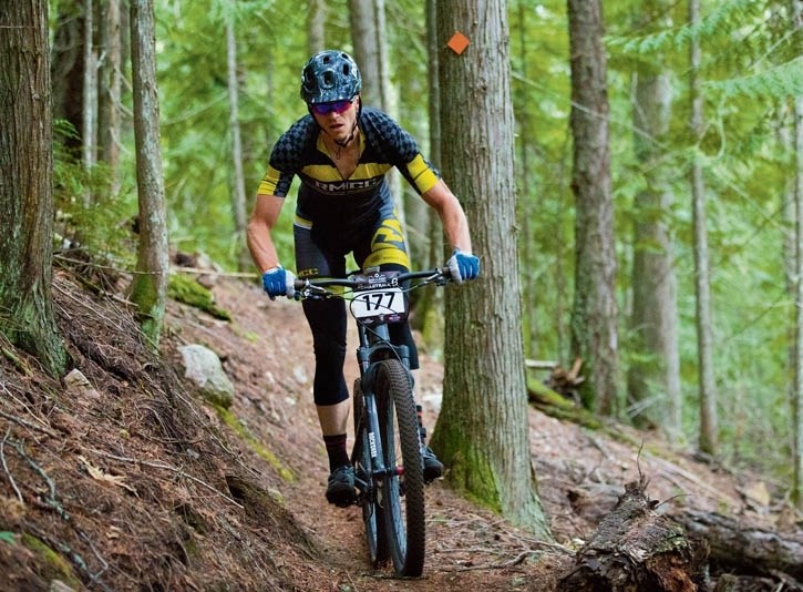 Simon Dove races to victory in the 40-plus men’s category of the SingleTrack 6 mountain bike stage race.
