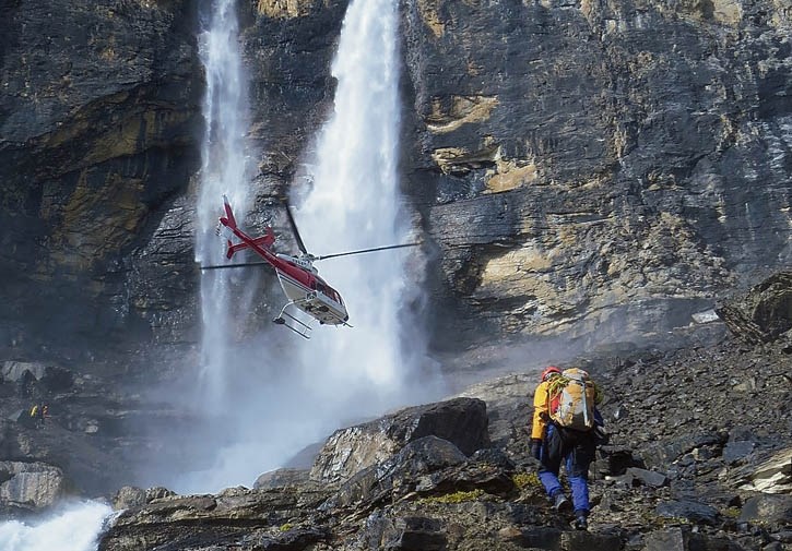 Parks Canada searches for the body of a 19-year-old man who was swept over Twin Falls.