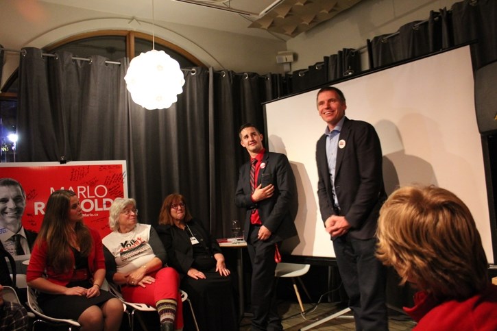 Liberal candidate Marlo Raynolds on election night at Communitea Café in Canmore with his campaign team and supporters.