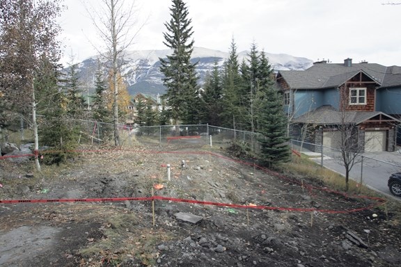 The sinkhole site adjacent to Dyrgas Gate in Canmore’s Three Sisters neighbourhood.