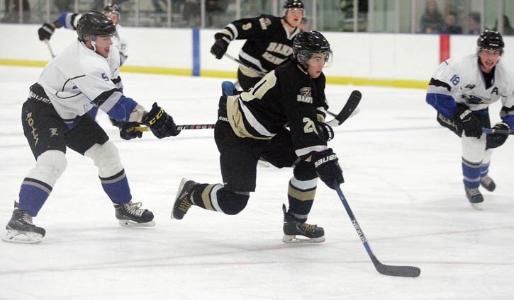 Nathan Cohen-Wallis carries the puck for the bears during Saturday’s (Nov. 7) loss to Stettler.