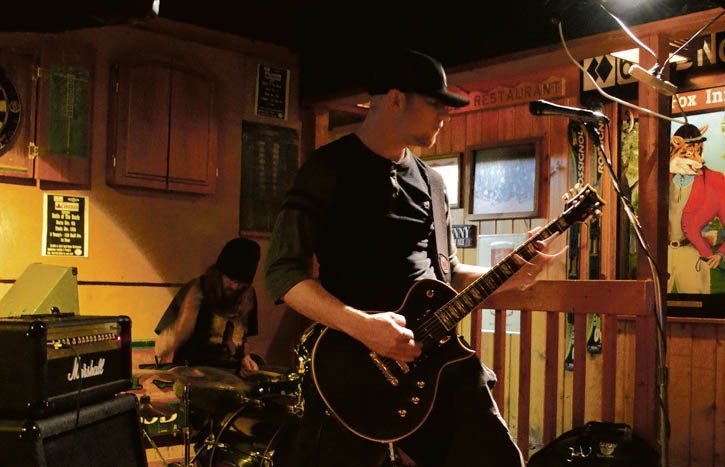 Local metal band Human Stain, Nick Christou (guitar) and Nick Tessier (drums), booms at the fourth annual Banff Battle of the Bands at Tommy’s Pub and Grill. The clash runs