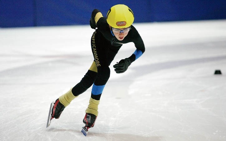 Sebastien Parent streaks around the ice during speedskating action at the Canmore Rec Centre Saturday (Dec. 12).