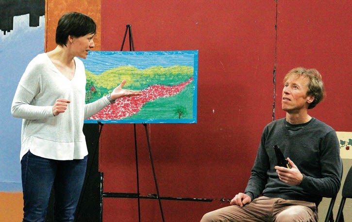 Jeremy White, right, as Miles, ponders Heidi Books’ (Lacy) explanation of her art during a rehearsal of My Narrator at the Canmore Miners’ Union Hall, Sunday (March 27).