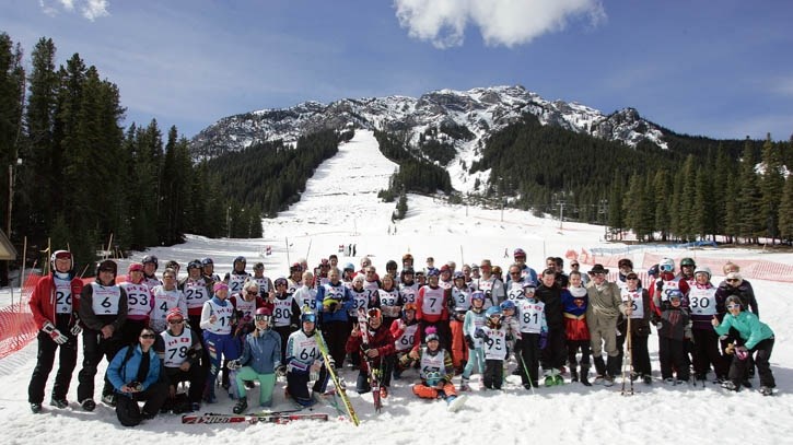 Participants in Saturday’s (April 2) Bruno Enger Family Ski Race at Mount Norquay gather for a group photo