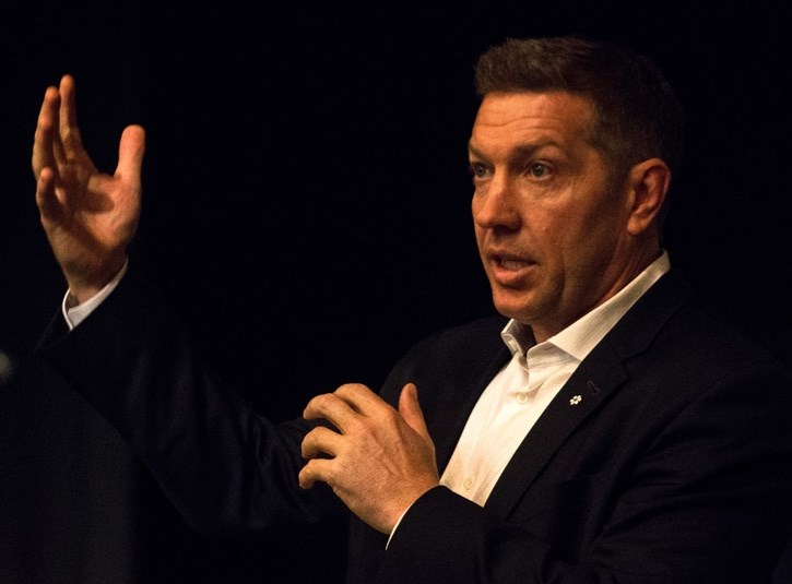 Sheldon Kennedy speaks at Canmore Collegiate High School on Friday (April 29).