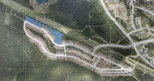 Three lots in the Peaks of Grassi subdivision are the subject of a legal challenge and judicial review to be held in January.