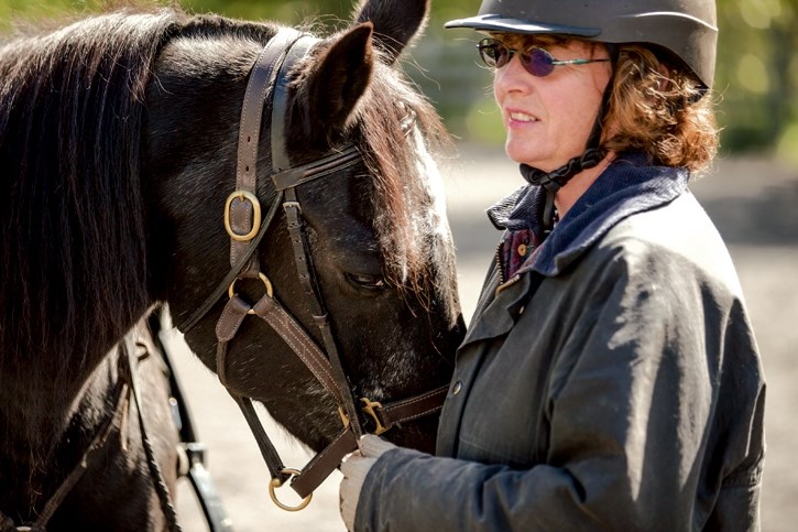 Lisa Young, secretary of the Bow Valley Riding Association (BVRA) stands with her horse Jewel at the BVRA paddock in Canmore on Thursday (Aug. 25). Jewel, a 26-year-old Arab