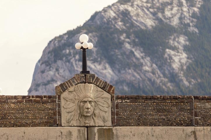 One of the First Nations reliefs on the Bow River Bridge in Banff.