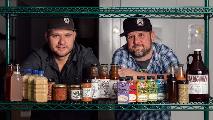 Bow Valley BBQ owner Jamie Ayles, left, along with operations manager Chris Dean show off some of the company’s products on Thursday (Dec. 8).