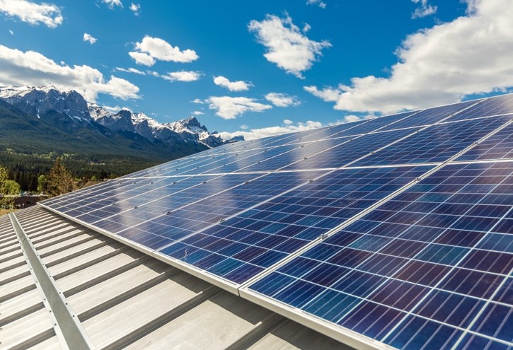 Solar panels line the roof of the Canmore Civic Centre on Friday (May 26). In all, 192 panels delivering 68,000 kilowatt hours of electric were unveiled by Mayor John