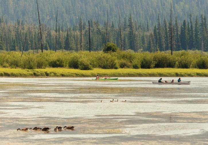 Boaters take to the waters of the Vermilion Lakes during a beautiful summer day in Banff on Sunday (July 30).