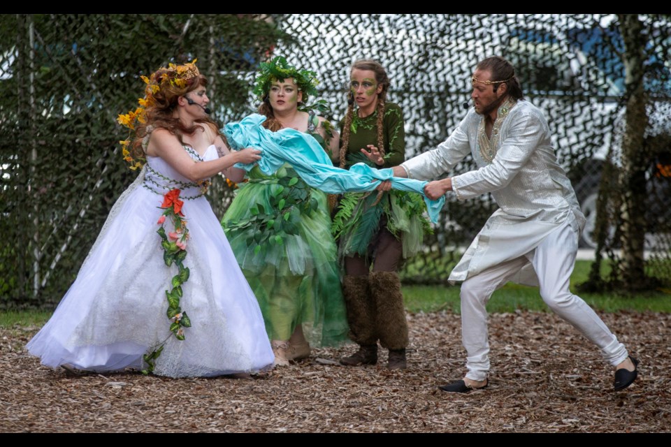 Titania, played by Kelsey Otto, left, and Oberon, played by Brian McDonald, tear at a cloth during a production of A Midsummer Night's Dream at Centennial Park in Canmore on Wednesday (July 10). The play was performed by the Pine Tree Players during the Canmore Summer Theatre Festival. ARYN TOOMBS RMO PHOTO