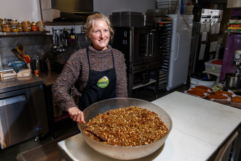 An Edible Life Kitchen owner Carole Beaton stirs oatmeal in her kitchen on Tuesday, Nov. 12, 2019. CHELSEA KEMP RMO PHOTO