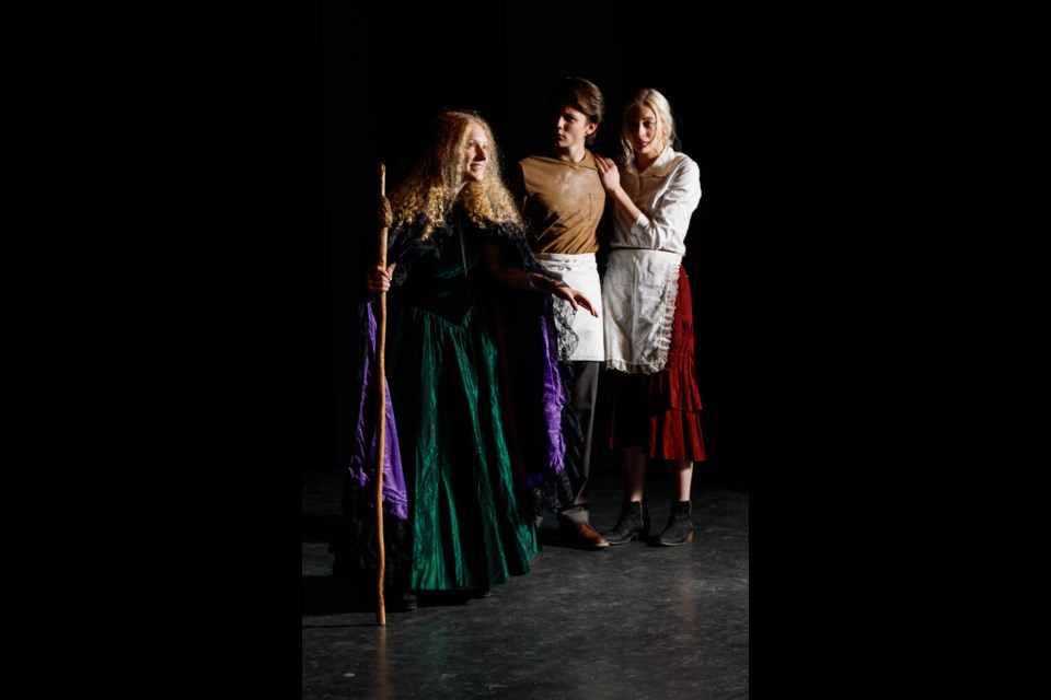 Leila Beaudet as the Witch, left,  Liam Brett as the Baker and Lindsay Nunn as the Baker''s Wife run through a dress rehearsal of the play Into the Woods Jr. at Canmore Collegiate High School on Tuesday, Nov. 19, 2019. CHELSEA KEMP RMO PHOTO