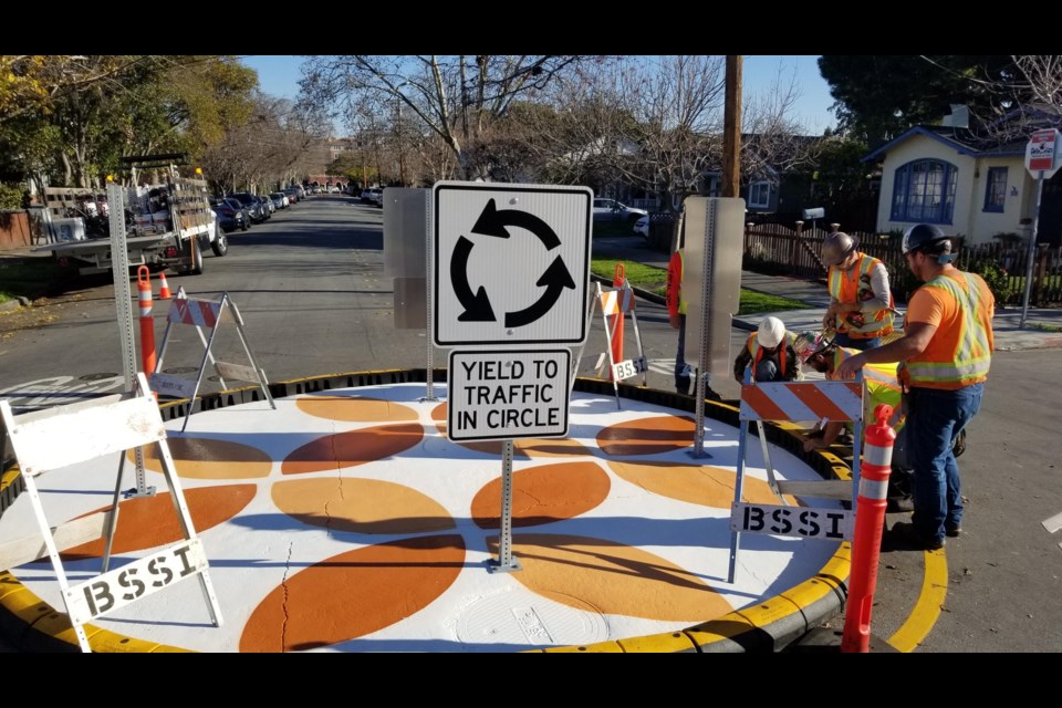 A freshly painted traffic circle, designed by local residents