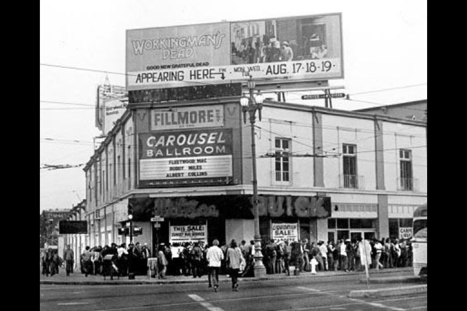 Fillmore West @ 10 South Van Ness Ave. San Francisco, CA in 1970; note the billboard for Workingman's Dead. Photo by Davygrvy via Wikipedia