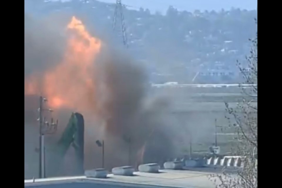 screen capture from video by Carson Predovich.  A first-alarm fire broke out Wednesday, March 9, 2022, at Sims Metal, a scrap metal recycling center on Seaport Boulevard in Redwood City. 