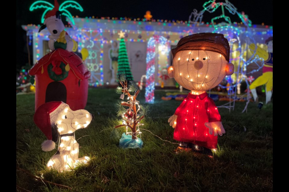 Derek Wolfgram's original Snoopy decorations still make an annual appearance in his holiday scene
