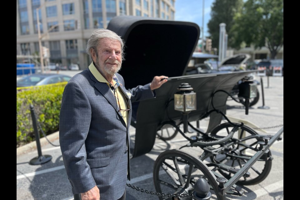 Keystone donor and building namesake Tad Taube, who contributed $7 million to the gallery, poses with a 1926 Ford Model T