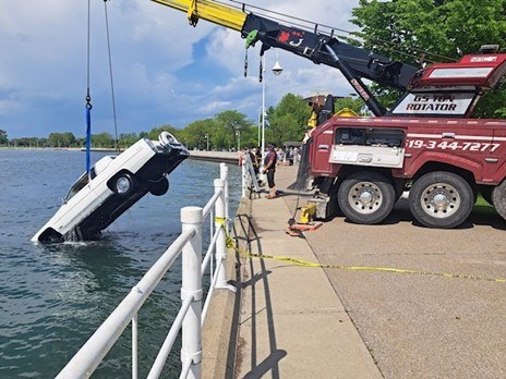 Police say two people escaped uninjured after a vehicle plunged into Sarnia Bay over the weekend.
