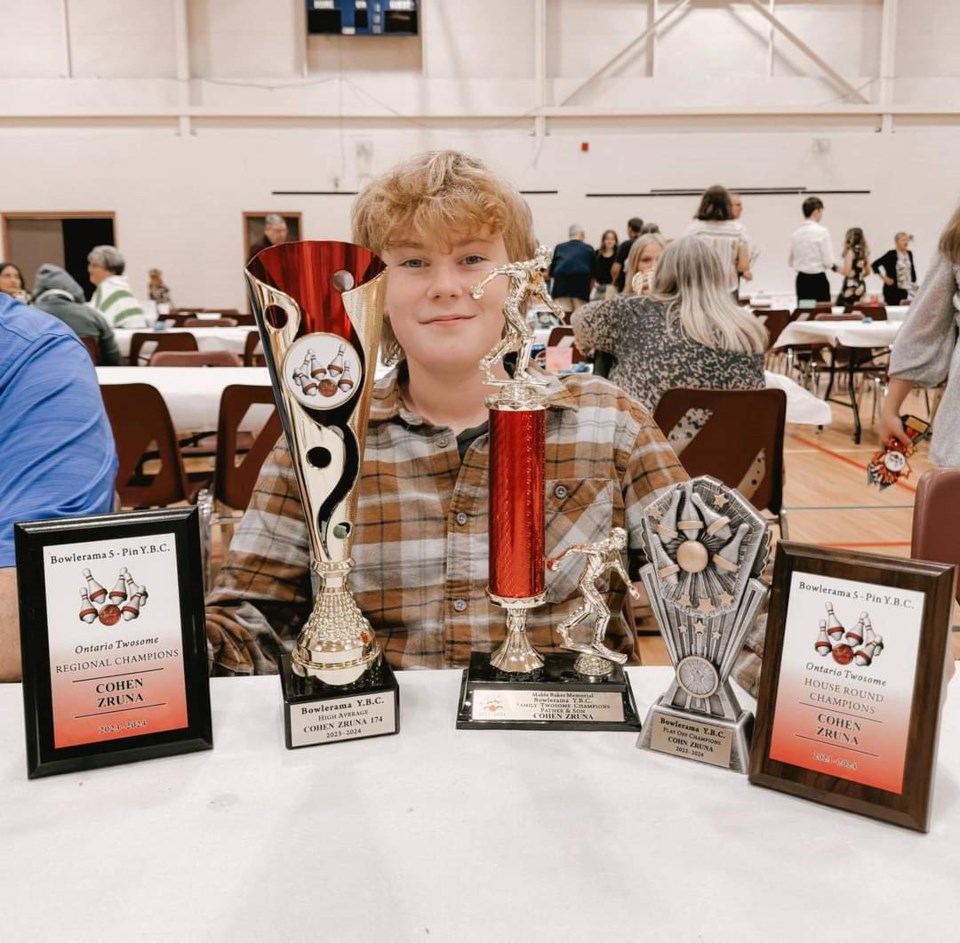 cohen-zruna-and-his-end-of-year-bowling-trophies