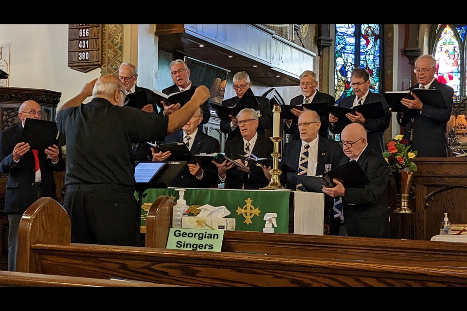 The group performing at All Saints Church.