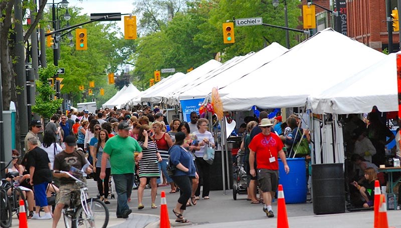 Crowds throng Christina Street during Artwalk 2013.Nore Penhale photo