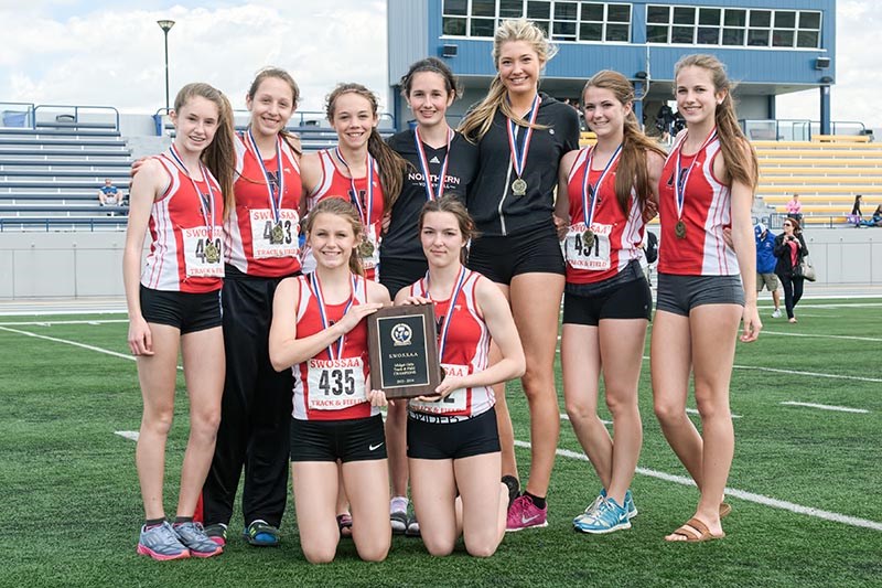 Winner of the women's midget team champion at the SWOSSA track and field finals was Northern Collegiate. Accepting the award here are, from left, back row: Sarah Scott, Abby Whiteye, Steph Shaw, Caitlyn Douglass, Carmen Handy, Steph Maitland and Julie Richmond. Kneeling in front are Skyla Minaker and Marissa Mara. Bruce Smith photo