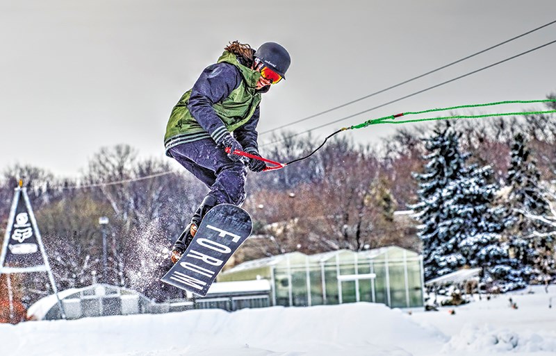 Dave Ouellette of Boarder Pass demonstrates the cable system behind the BP Snow Park, which offers a version of skiing and snowboarding in hill-less Sarnia. Glenn Ogilvie