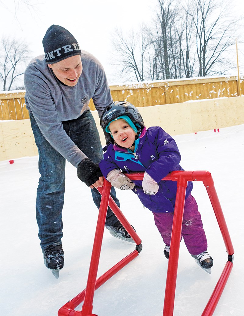 Daisy Robitalle learns to skate while getting a helping hand from dad Paul. Glenn Ogilvie