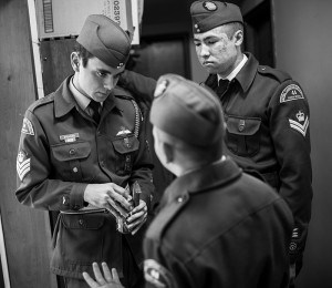Clockwise: Warrant Officer 2nd Class Sean Stevens and Sgt. Kyle Wygergangs speak privately with Flight Corporal Jason McDowell, immediately after McDowell was involved in a disagreement with another cadet. Most minor conflicts are mediated by the higher-ranking cadets. Troy Shantz
