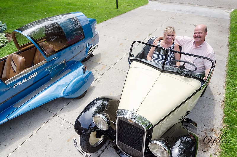 Kenn and Donna Poore pose for a photo in their 1932 American Austin Roadster. Glenn Ogilvie